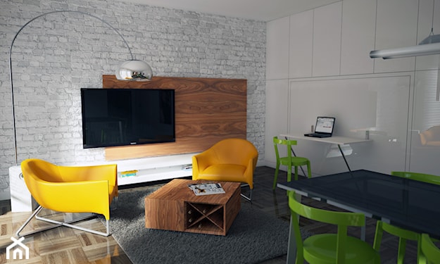 industrialny salon, zielone krzesła, żółte fotele, biała cegła, metalowa lampa podłogowa, telewizor na ścianie