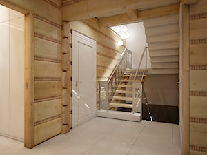 Dom z bali urządzony nowocześnie - Mały beżowy hol / przedpokój, styl nowoczesny - zdjęcie od NatusDESIGN