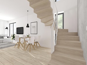 Duża biała szara jadalnia w salonie, styl skandynawski - zdjęcie od INTERJO Projektowanie Wnętrz
