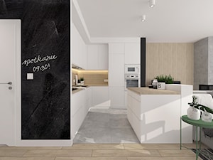 Duża otwarta z salonem czarna z zabudowaną lodówką kuchnia w kształcie litery l z wyspą lub półwyspem, styl skandynawski - zdjęcie od INTERJO Projektowanie Wnętrz