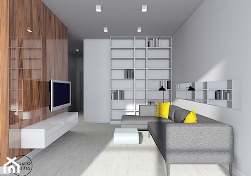 Błyszczące mieszkanie - Średni biały salon z bibiloteczką - zdjęcie od Studio Malina – Architekci & Projektanci wnętrz