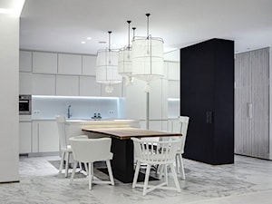Wnętrza: Biały apartament - Duża otwarta z salonem kuchnia jednorzędowa, styl nowoczesny - zdjęcie od Small world of design