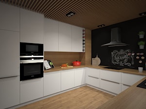 Mieszkanie 60m2 Iława - Średnia otwarta czarna z zabudowaną lodówką z nablatowym zlewozmywakiem kuchnia w kształcie litery u, styl nowoczesny - zdjęcie od PRACOVNIA Projektowanie wnętrz