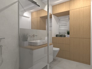 Jasna łazienka z elementami drewna - zdjęcie od W+ Architekci