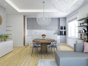 Nowoczesny salon w odcieniach szarości - Duży biały szary salon z kuchnią z jadalnią, styl nowoczesny - zdjęcie od Creatovnia