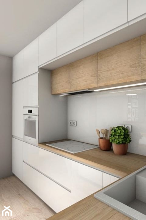 Średnia otwarta z salonem biała z zabudowaną lodówką kuchnia w kształcie litery l, styl nowoczesny - zdjęcie od Milena Bajno