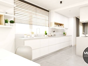 Kuchnia w białych kolorach z elementami ciepłego drewna - zdjęcie od MONOstudio