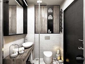 Drewno i czarne wykończenia w łazience - zdjęcie od MONOstudio