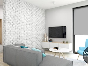 Salon z elementem cegły - zdjęcie od MONOstudio