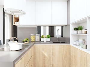 Kuchnia w bieli i drewnie - zdjęcie od MONOstudio