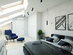 Przytulna sypialnia z wykorzystaniem cegły - zdjęcie od MONOstudio