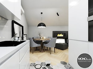 Stylowe mieszkanie z antresolą - Mała biała jadalnia w salonie, styl minimalistyczny - zdjęcie od MONOstudio