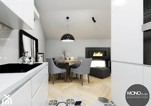 Stylowe mieszkanie z antresolą - Mała biała jadalnia w salonie, styl minimalistyczny - zdjęcie od MONOstudio