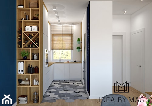 Segment. - Mała otwarta biała z zabudowaną lodówką z podblatowym zlewozmywakiem kuchnia w kształcie litery u z oknem, styl skandynawski - zdjęcie od Idea by Mag.