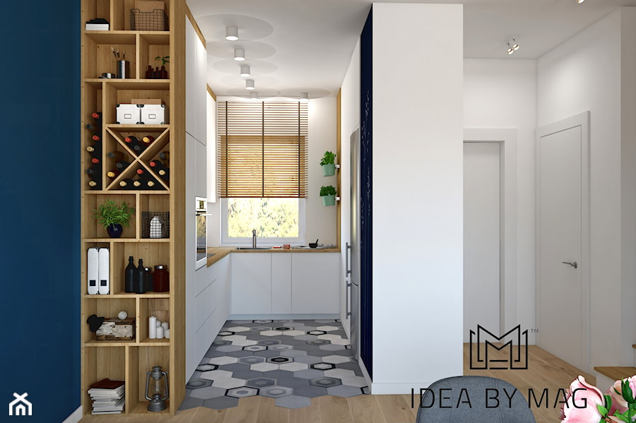 Segment. - Mała otwarta biała z zabudowaną lodówką z podblatowym zlewozmywakiem kuchnia w kształcie litery u z oknem, styl skandynawski - zdjęcie od Idea by Mag.