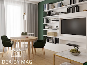 Klasa. - Średni biały zielony salon z jadalnią z bibiloteczką - zdjęcie od Idea by Mag.