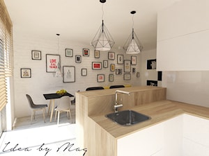 Nowoczesna wariacja. - Mała biała jadalnia w salonie w kuchni, styl nowoczesny - zdjęcie od Idea by Mag.