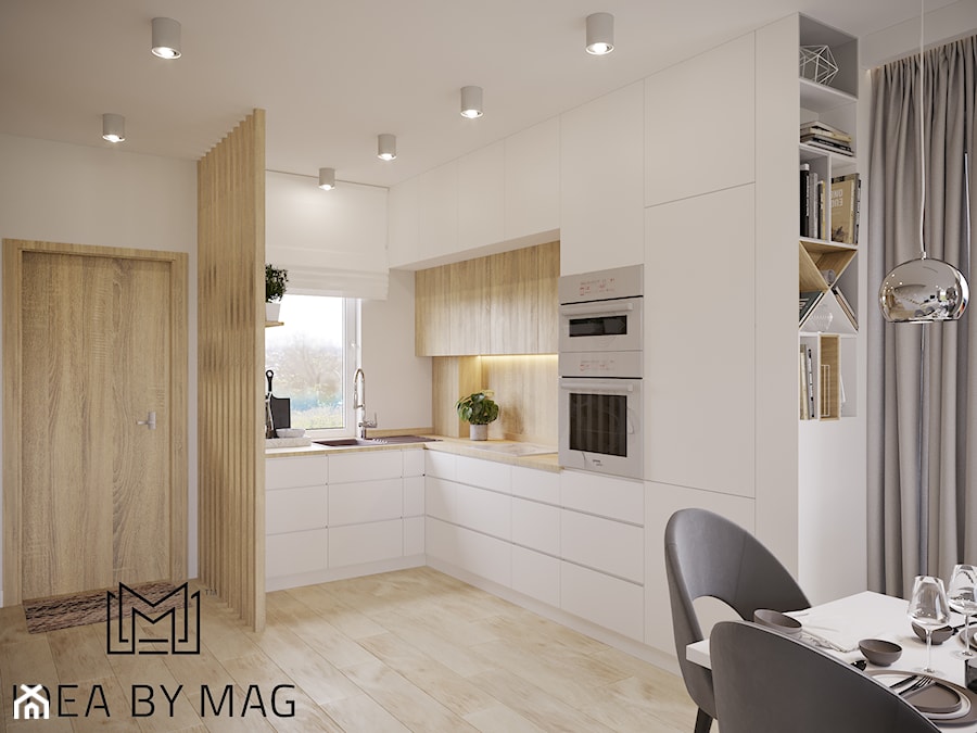 Klasyczna prostota - Mała otwarta z salonem biała z zabudowaną lodówką z nablatowym zlewozmywakiem kuchnia w kształcie litery l z oknem, styl minimalistyczny - zdjęcie od Idea by Mag.