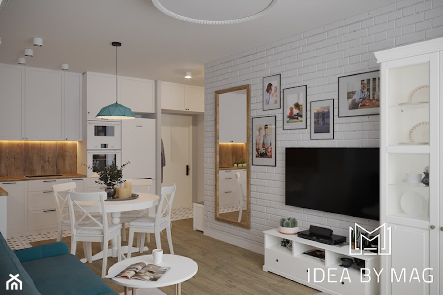 Skandynawskie wnętrze ze szczyptą koloru - Mały biały salon z kuchnią z jadalnią, styl skandynawski - zdjęcie od Idea by Mag.