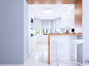 Kuchnia - Dom Gać Warcka - Duża otwarta biała z zabudowaną lodówką kuchnia w kształcie litery g z wyspą lub półwyspem z oknem, styl minimalistyczny - zdjęcie od Klaudia Tworo Projektowanie Wnętrz