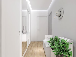 Mieszkanie w Łodzi - Średni z wieszakiem biały hol / przedpokój - zdjęcie od Klaudia Tworo Projektowanie Wnętrz
