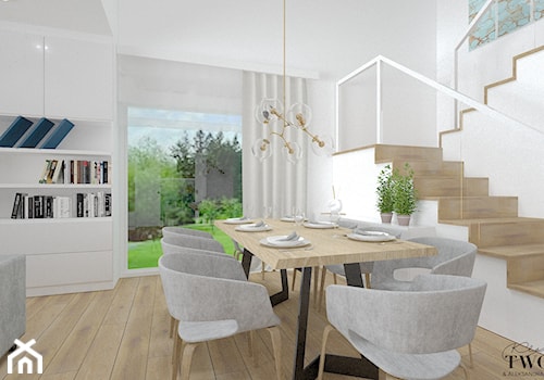 Dom w Jarocinie - Średnia biała jadalnia w salonie, styl nowoczesny - zdjęcie od Klaudia Tworo Projektowanie Wnętrz