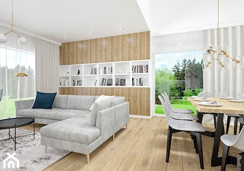 Dom w Jarocinie - Duży biały salon z jadalnią z bibiloteczką, styl nowoczesny - zdjęcie od Klaudia Tworo Projektowanie Wnętrz
