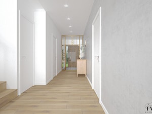 Dom w Jarocinie - Duży biały szary hol / przedpokój, styl nowoczesny - zdjęcie od Klaudia Tworo Projektowanie Wnętrz