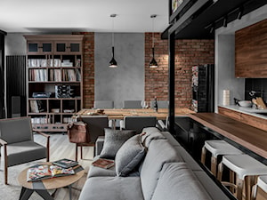 Apartament w Gdańsku - Duży czarny szary salon z kuchnią z jadalnią, styl nowoczesny - zdjęcie od SIKORA WNĘTRZA