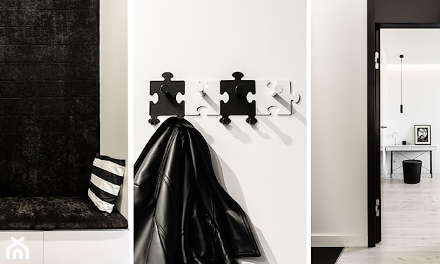 biało-czarny nowoczesny wieszak w kształcie puzzli