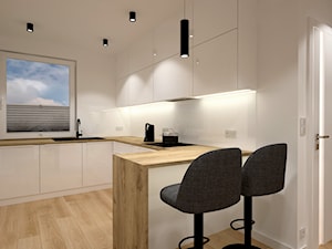 Klimatyczne mieszkanie w bloku z wielkiej płyty - Średnia otwarta biała z zabudowaną lodówką z lodówką wolnostojącą z nablatowym zlewozmywakiem kuchnia w kształcie litery g z oknem, styl nowoczesny - zdjęcie od Miliart Studio