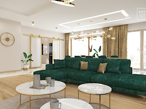 Duży salon w złocie i butelkowej zieleni - zdjęcie od Miliart Studio