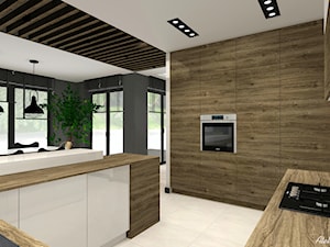 Projekt Domu - Duża z salonem biała z zabudowaną lodówką kuchnia w kształcie litery g z wyspą lub półwyspem z oknem, styl nowoczesny - zdjęcie od Atelier Art&Design