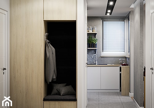 Mieszkanie os. Wilno - Mały z wieszakiem biały hol / przedpokój, styl nowoczesny - zdjęcie od DEDEKO