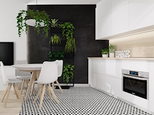 Mieszkanie we Wrocławiu - Średnia otwarta czarna szara z zabudowaną lodówką kuchnia jednorzędowa, styl nowoczesny - zdjęcie od KP Pure Form