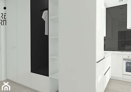 Projekt mieszkania z aneksem_Katowice - Mały z wieszakiem biały hol / przedpokój, styl skandynawski - zdjęcie od KP Pure Form