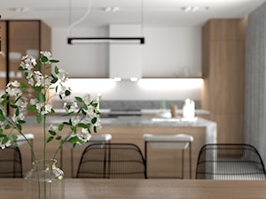 Projekt domu w Gliwicach - Średnia otwarta biała szara z zabudowaną lodówką kuchnia jednorzędowa z wyspą lub półwyspem z oknem z marmurem nad blatem kuchennym, styl nowoczesny - zdjęcie od KP Pure Form