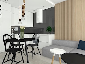 Projekt mieszkania z aneksem_Katowice - Mały szary salon z kuchnią z jadalnią, styl skandynawski - zdjęcie od KP Pure Form