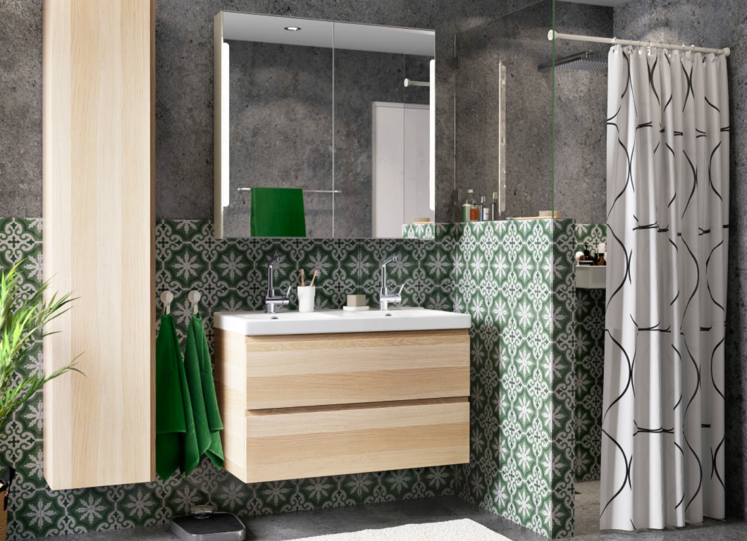 zielona łazienka z betonem na ścianach