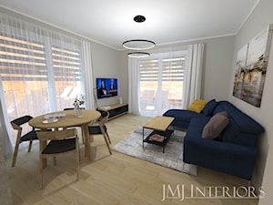 Komfortowe mieszkanie dla młodego małżeństwa - Gdańsk - Średni szary salon z jadalnią - zdjęcie od JMJ Interiors