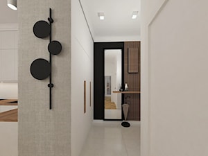 Elegancki przedpokój z drewnianymi lamelami - zdjęcie od JMJ Interiors