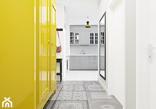 Przedpokój z żółtą szafą - zdjęcie od Drob Design