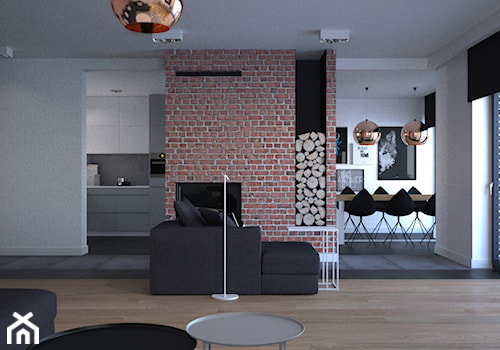 widok z salonu na kominek, kuchnię oraz jadalnię - zdjęcie od mootif_studio