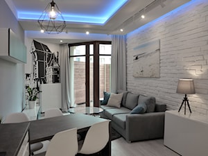 Apartament wakacyjny - Neptun Park Gdańsk - 42m2 - 2017 - Mały biały salon z jadalnią, styl skandynawski - zdjęcie od Studio86