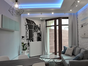 Apartament wakacyjny - Neptun Park Gdańsk - 42m2 - 2017 - Średni biały szary salon z jadalnią, styl nowoczesny - zdjęcie od Studio86