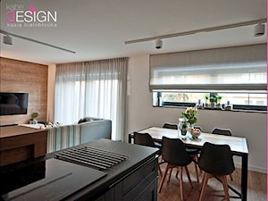 Projekt Września - Średnia biała jadalnia w salonie w kuchni, styl industrialny - zdjęcie od kabeDesign kasia białobłocka