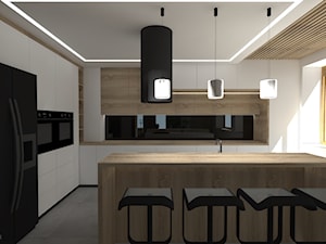 Dom 1 - Duża zamknięta biała czarna z zabudowaną lodówką kuchnia w kształcie litery l z wyspą lub półwyspem z oknem - zdjęcie od zuzanna-hyla