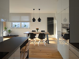Mieszkanie Warszawa Tarchomin - Średnia biała jadalnia w kuchni, styl nowoczesny - zdjęcie od Pracownia Projektowania | Daria Ciuńczyk-Duda