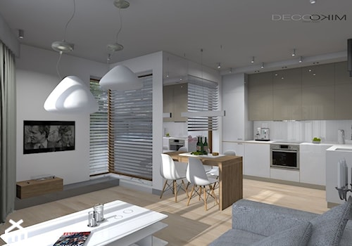 Wnętrze apartamentu z widokiem na Wisłę o powierzchni 60,40 m² - Średnia otwarta z zabudowaną lodówką kuchnia w kształcie litery l z oknem, styl nowoczesny - zdjęcie od Deco Miko