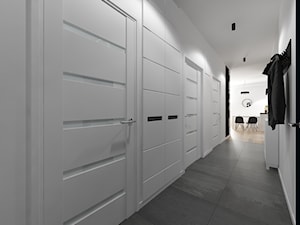 Wnętrze mieszkania na Widzewie - Średni z wieszakiem biały hol / przedpokój, styl nowoczesny - zdjęcie od Tu architekci